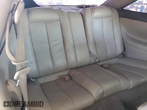 1999 Toyota Solara SE z VIN 2T1CF22P4XC171139, wystawiony jako Copart lot #58728195 z przebiegiem 148 703 mil mil oraz Szkoda całkowita • Salvage title. Historia ofert i sprzedaży dostępna na DreamBid. Obrazek 10.