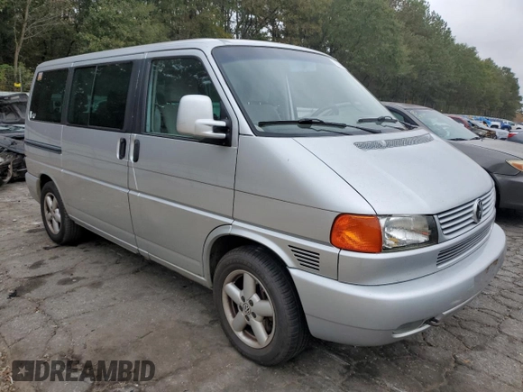 2002 Volkswagen EuroVan с VIN WV2KB47022H065941, выставлен на аукционе Copart как лот 79238234 с пробегом Не указан миль и Чистый • Clean title. История ставок и продаж доступна на DreamBid. Изображение 4.