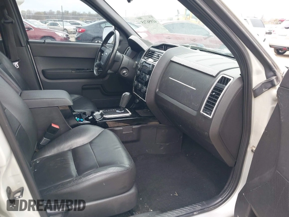 2008 Ford Escape Limited with VIN 1FMCU94108KB33023, listed as a IAAI auction lot 41956715 with 144,421 mi miles. Bid and sale history available at carsss.com. Image 5.