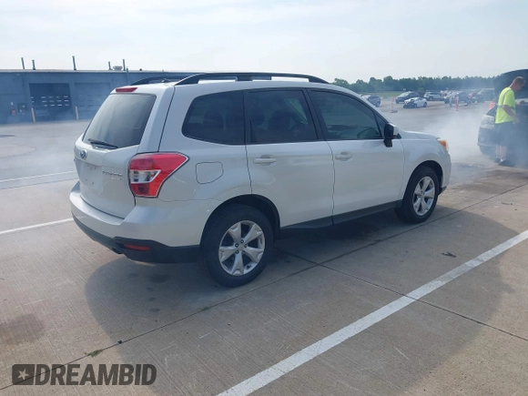 2014 Subaru Forester Premium with VIN JF2SJAECXEH545972, listed as a IAAI auction lot 42874819 with 161,769 mi miles and . Bid and sale history available at DreamBid. Image 4.