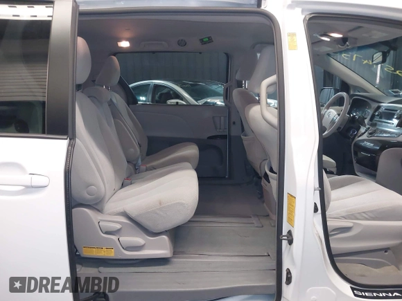 2014 Toyota Sienna LE AAS with VIN 5TDKK3DCXES499628, listed as a IAAI auction lot 42574730 with 110,532 mi miles and . Bid and sale history available at DreamBid. Image 8.