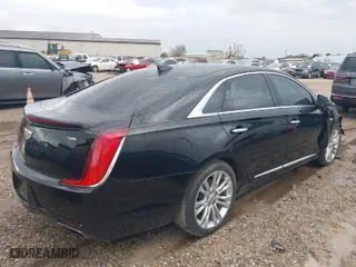 2019 Cadillac XTS Luxury with VIN 2G61M5S32K9141807, listed as a IAAI auction lot 41818444 with 84,864 mi miles. Bid and sale history available at carsss.com. Image 4.