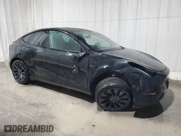 2022 Tesla Model Y Performance with VIN 7SAYGDEF3NF453267, listed as a Copart auction lot 53787615 with 82,452 mi miles and Salvage Title. Bid and sale history available at DreamBid. Image 4.