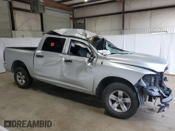 2018 Ram 1500 Tradesman with VIN 1C6RR6KTXJS340700, listed as a Copart auction lot 82818964 with Not provided miles and Salvage title. Bid and sale history available at DreamBid. Image 4.