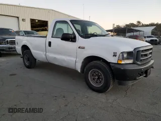 2002 Ford Super Duty F-250 XL with VIN 1FTNF20L32EA82290, listed as a Copart auction lot 82052494 with 133,019 mi miles and Clean Title. Bid and sale history available at carsss.com. Image 4.