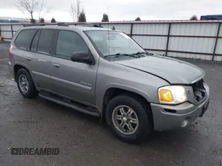2006 GMC Envoy SLE with VIN 1GKDT13S862232455, listed as a IAAI auction lot 41483418 with 198,267 mi miles. Bid and sale history available at carsss.com. Image 1.