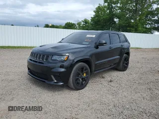 2018 Jeep Grand Cherokee Trackhawk with VIN 1C4RJFN94JC377140, listed as a Copart auction lot 61444285 with 35,240 mi miles and Salvage title. Bid and sale history available at DreamBid. Image 1.