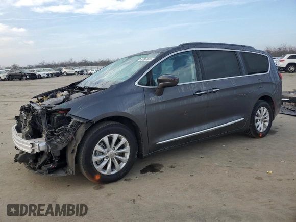 2017 Chrysler Pacifica Touring L with VIN 2C4RC1BG4HR593152, listed as a Copart auction lot 87869615 with 83,292 mi miles and Salvage Title. Bid and sale history available at DreamBid. Image 1.