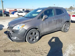 2014 Buick Encore Convenience with VIN KL4CJBSB5EB742534, listed as a IAAI auction lot 41655547 with 63,199 mi miles and . Bid and sale history available at DreamBid. Image 2.