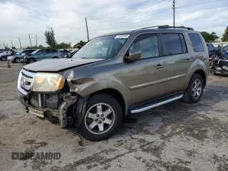 2010 Honda Pilot Touring with VIN 5FNYF3H81AB016255, listed as a Copart auction lot 71052644 with 96,847 mi miles and Salvage Title. Bid and sale history available at DreamBid. Image 1.
