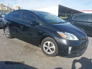 2014 Toyota Prius Four with VIN JTDKN3DU6E1831464, listed as a IAAI auction lot 42620934 with 220,967 mi miles and . Bid and sale history available at DreamBid. Image 1.