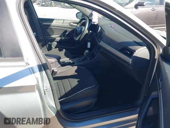 2023 Volkswagen Jetta Sport with VIN 3VWBM7BU5PM016768, listed as a IAAI auction lot 41427777 with 32,950 mi miles and . Bid and sale history available at DreamBid. Image 5.