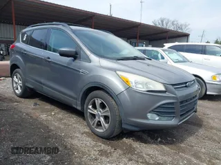 2013 Ford Escape SE with VIN 1FMCU0GX8DUB98700, listed as a IAAI auction lot 42012090 with 221,394 mi miles. Bid and sale history available at carsss.com. Image 1.
