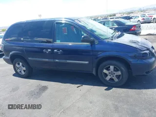 2005 Dodge Caravan SXT with VIN 1D8GP45R65B280660, listed as a IAAI auction lot 42169027 with 246,407 mi miles and . Bid and sale history available at carsss.com. Image 13.