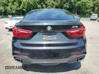 2018 BMW X6 xDrive35i with VIN 5UXKU2C55J0X51191, listed as a Copart auction lot 63567013 with 58,144 mi miles. Bid and sale history available at carsss.com. Image 6.