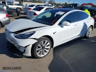 2018 Tesla Model 3 Long Range Battery with VIN 5YJ3E1EA7JF012378, listed as a IAAI auction lot 41755312 with 68184 miles. Bid and sale history available at carsss.com. Image 2.