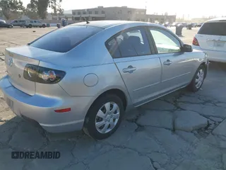 2007 Mazda 3 i Sport with VIN JM1BK12F371721573, listed as a IAAI auction lot 41776548 with 152,317 mi miles and . Bid and sale history available at carsss.com. Image 4.