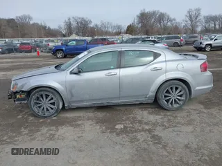 2014 Dodge Avenger SE with VIN 1C3CDZABXEN155014, listed as a IAAI auction lot 41554588 with 154,145 mi miles and . Bid and sale history available at DreamBid. Image 14.