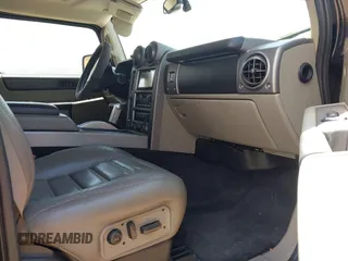2003 Hummer H2 with VIN 5GRGN23U73H122756, listed as a IAAI auction lot 42194176 with 239,411 mi miles. Bid and sale history available at carsss.com. Image 5.