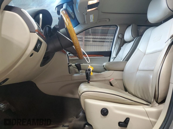 2013 Jeep Grand Cherokee Overland with VIN 1C4RJECT6DC526032, listed as a Copart auction lot 55660905 with 97,406 mi miles and Salvage Title. Bid and sale history available at DreamBid. Image 7.