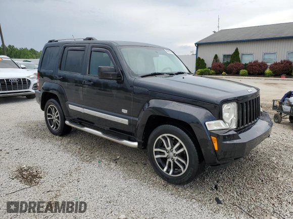 2011 Jeep Liberty Sport with VIN 1J4PN2GK5BW561274, listed as a Copart auction lot 60652555 with 89,309 mi miles and Salvage title. Bid and sale history available at DreamBid. Image 4.