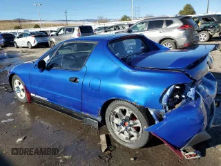 1994 Honda del Sol S with VIN JHMEG1142RS000753, listed as a Copart auction lot 80063034 with 214,736 mi miles and Salvage Title. Bid and sale history available at carsss.com. Image 2.