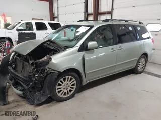 2009 Toyota Sienna XLE with VIN 5TDZK22C59S256844, listed as a IAAI auction lot 41668889 with 299,124 mi miles. Bid and sale history available at carsss.com. Image 17.