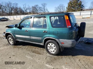 1999 Honda CR-V LX with VIN JHLRD184XXC083344, listed as a Copart auction lot 86395264 with 165,141 mi miles and Salvage Title. Bid and sale history available at carsss.com. Image 2.