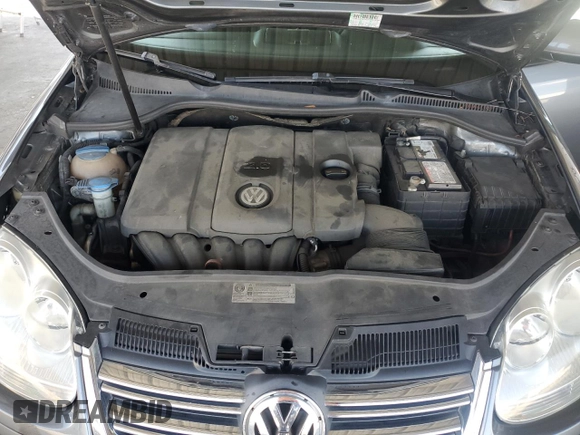 2010 Volkswagen Jetta S with VIN 3VWJZ7AJ9AM052569, listed as a Copart auction lot 59016965 with 166,950 mi miles and Salvage title. Bid and sale history available at DreamBid. Image 11.
