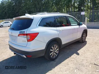 2020 Honda Pilot EX-L z VIN 5FNYF6H56LB010316, wystawiony jako IAAI lot #42433400 z przebiegiem 48 764 mil mil oraz . Historia ofert i sprzedaży dostępna na DreamBid. Obrazek 4.
