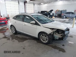 2016 Ford Focus SE z VIN 1FADP3F23GL217497, wystawiony jako IAAI lot #41307013 z przebiegiem 65 439 mil mil oraz . Historia ofert i sprzedaży dostępna na DreamBid. Obrazek 1.