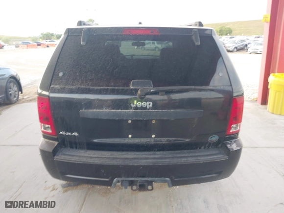 2005 Jeep Grand Cherokee Laredo with VIN 1J4HR48N75C647740, listed as a IAAI auction lot 41803160 with 145,147 mi miles. Bid and sale history available at carsss.com. Image 16.
