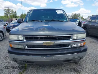 2002 Chevrolet Suburban LS z VIN 3GNEC16Z62G255198, wystawiony jako IAAI lot #42312829 z przebiegiem 192 459 mil mil oraz . Historia ofert i sprzedaży dostępna na DreamBid. Obrazek 12.