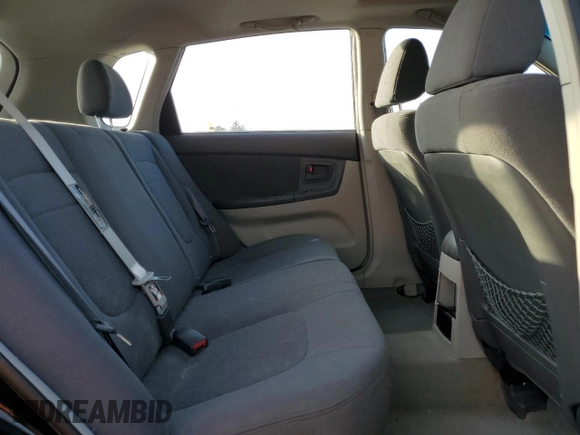 2005 Kia Spectra with VIN KNAFE161655093051, listed as a Copart auction lot 77821904 with 104,874 mi miles and Salvage Title. Bid and sale history available at carsss.com. Image 10.