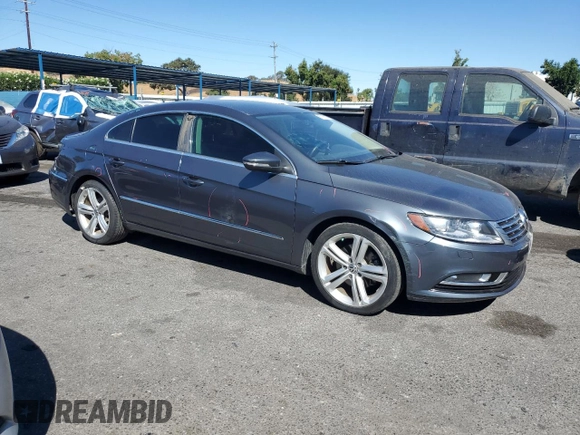 2013 Volkswagen CC R-Line with VIN WVWBP7AN2DE501472, listed as a Copart auction lot 67165124 with 101,033 mi miles and Salvage Title. Bid and sale history available at DreamBid. Image 4.