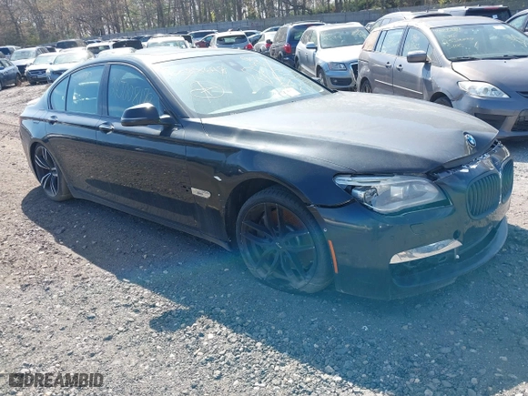 2015 BMW 7 Series 750i xDrive with VIN WBAYB6C57FD965802, listed as a IAAI auction lot 40588698 with 999,999 mi miles. Bid and sale history available at carsss.com. Image 1.