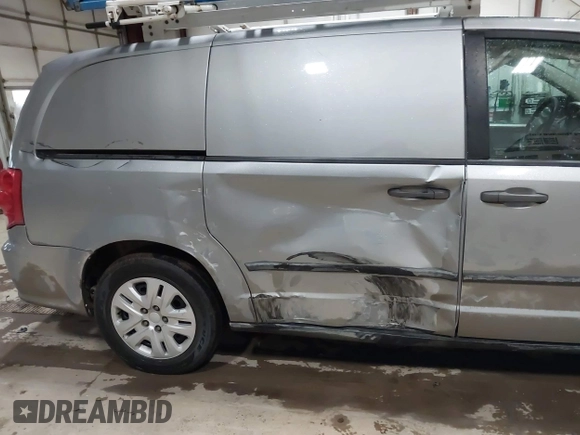 2014 Ram Cargo Van with VIN 2C4RRGAG9ER312915, listed as a IAAI auction lot 41947886 with 149,144 mi miles and . Bid and sale history available at DreamBid. Image 6.