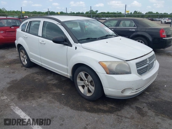 2011 Dodge Caliber Mainstreet with VIN 1B3CB3HA0BD157191, listed as a IAAI auction lot 42128580 with 185,474 mi miles. Bid and sale history available at carsss.com. Image 1.
