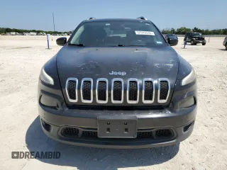 2016 Jeep Cherokee Altitude with VIN 1C4PJLCS0GW171848, listed as a Copart auction lot 52943535 with 141,686 mi miles and Clean Title. Bid and sale history available at carsss.com. Image 5.