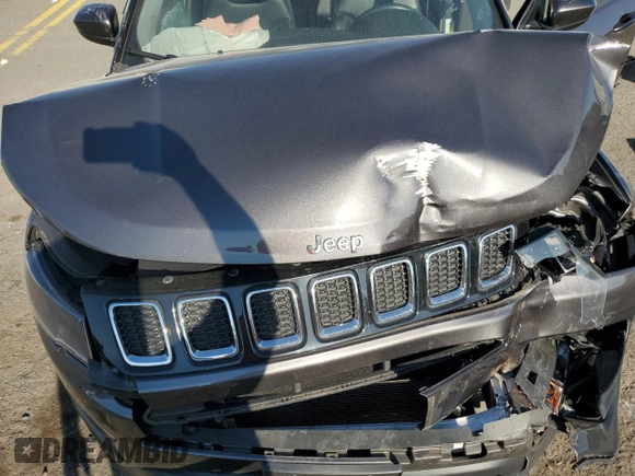 2020 Jeep Compass Latitude with VIN 3C4NJDBB4LT255556, listed as a Copart auction lot 76440714 with 19,102 mi miles and Salvage Title. Bid and sale history available at DreamBid. Image 14.