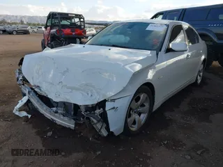 2007 BMW 5 Series 530i with VIN WBANE73537CM56751, listed as a IAAI auction lot 41461577 with 218,059 mi miles. Bid and sale history available at carsss.com. Image 2.