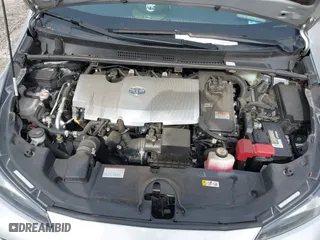 2021 Toyota Prius L Eco with VIN JTDKAMFU1M3152848, listed as a IAAI auction lot 41600212 with 140,114 mi miles. Bid and sale history available at carsss.com. Image 10.