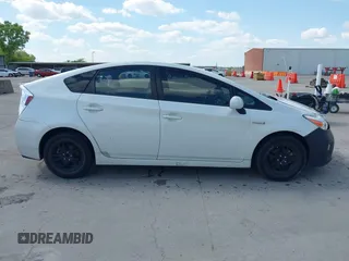 2015 Toyota Prius Four z VIN JTDKN3DU6F1995900, wystawiony jako IAAI lot #42244996 z przebiegiem 99 928 mil mil oraz . Historia ofert i sprzedaży dostępna na DreamBid. Obrazek 13.