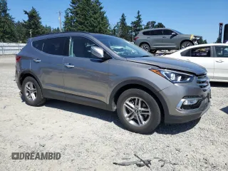 2018 Hyundai Santa Fe 2.4L with VIN 5NMZUDLB7JH106169, listed as a Copart auction lot 64465735 with 21,564 mi miles and Salvage title. Bid and sale history available at DreamBid. Image 4.