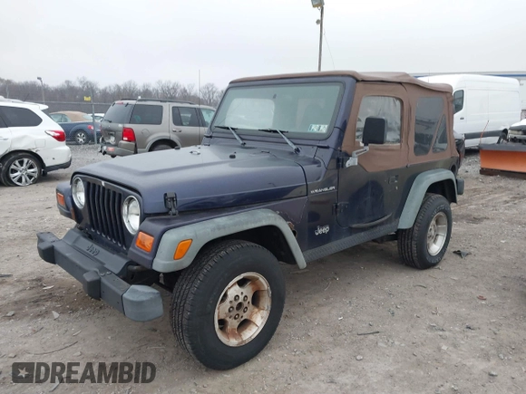 1998 Jeep Wrangler SE with VIN 1J4FY29P9WP792089, listed as a IAAI auction lot 41794793 with 200,838 mi miles. Bid and sale history available at carsss.com. Image 2.
