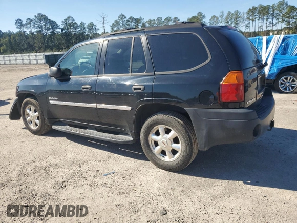 2006 GMC Envoy SLT with VIN 1GKDT13S462359008, listed as a Copart auction lot 80014324 with 158,906 mi miles and Salvage Title. Bid and sale history available at carsss.com. Image 2.