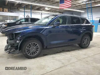 2021 Mazda CX-5 Touring z VIN JM3KFBCM4M0370480, wystawiony jako Copart lot #52208445 z przebiegiem 41 287 mil mil oraz Szkody całkowita. Historia ofert i sprzedaży dostępna na DreamBid. Obrazek 1.