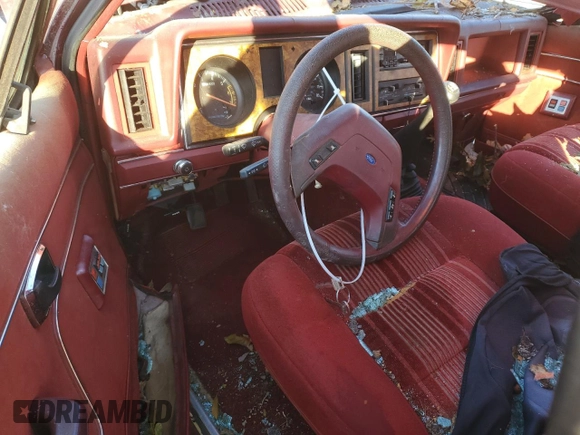 1988 Ford Bronco z VIN 1FMCU14T3JUD16266, wystawiony jako Copart lot #77365034 z przebiegiem 81 445 mil mil oraz Szkoda całkowita • Salvage title. Historia ofert i sprzedaży dostępna na DreamBid. Obrazek 8.