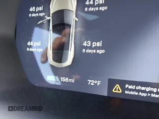 2015 Tesla Model S 85 with VIN 5YJSA1E14FF120455, listed as a IAAI auction lot 42053306 with 62,817 mi miles and . Bid and sale history available at DreamBid. Image 17.