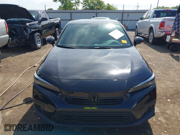 2023 Honda Civic Sport with VIN 2HGFE2F58PH557787, listed as a IAAI auction lot 42207827 with 51,885 mi miles and . Bid and sale history available at DreamBid. Image 12.